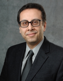 Headshot of man in tie